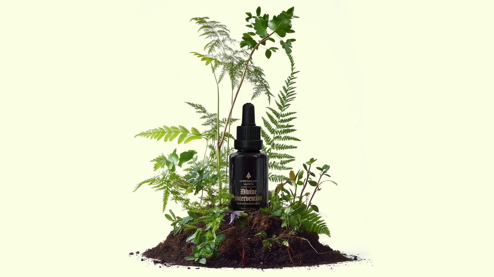 Divine Intervention bottle with botanicals growing around it