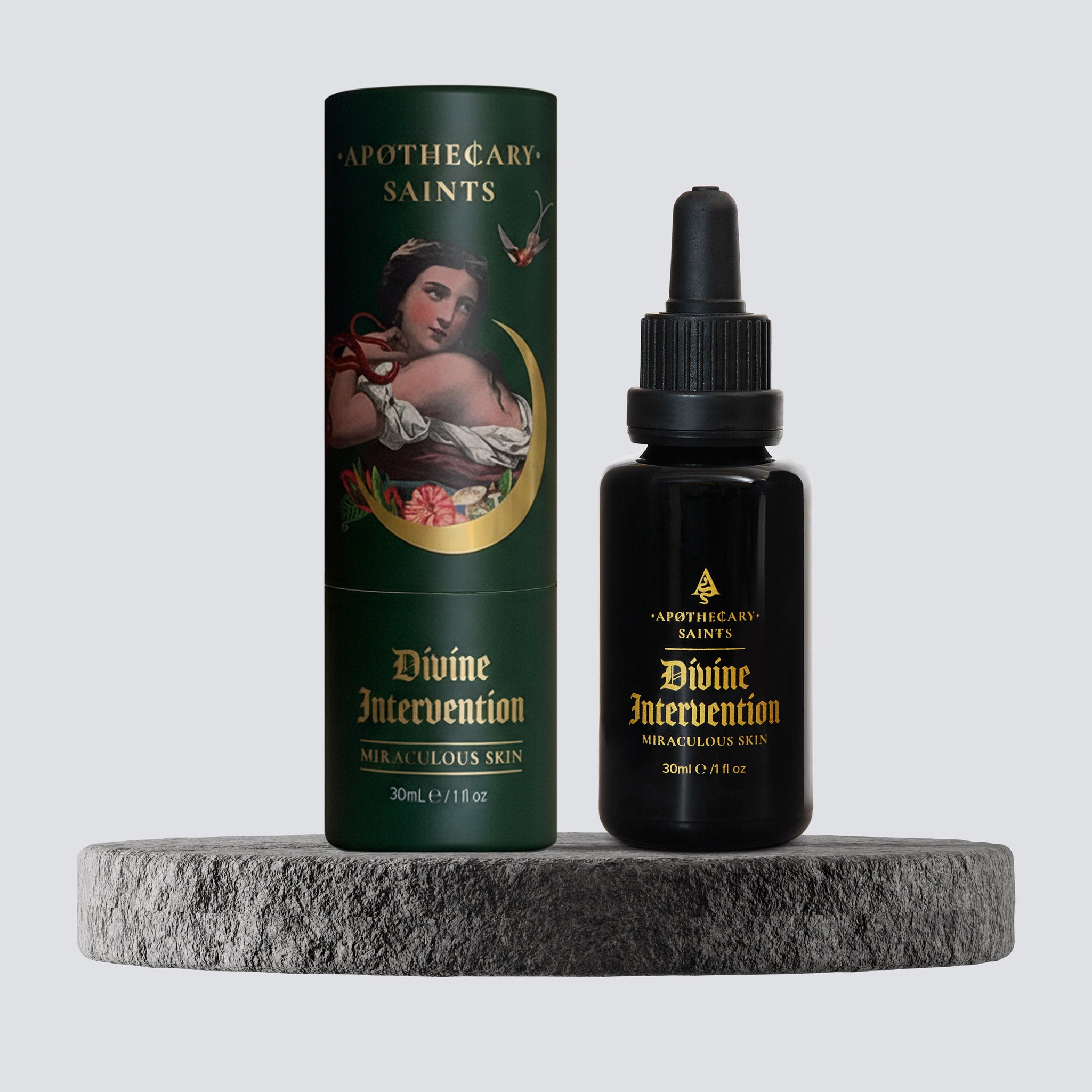 divine intervention face oil packaging on grey stone